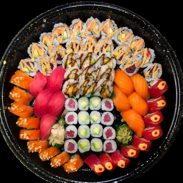 A large platter of Saisaki Van Wert sushi rolls, nigiri, and sashimi, with ginger and wasabi.